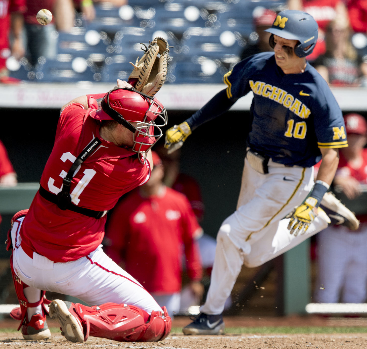 Nebraska vs. Michigan, first game, 5.25